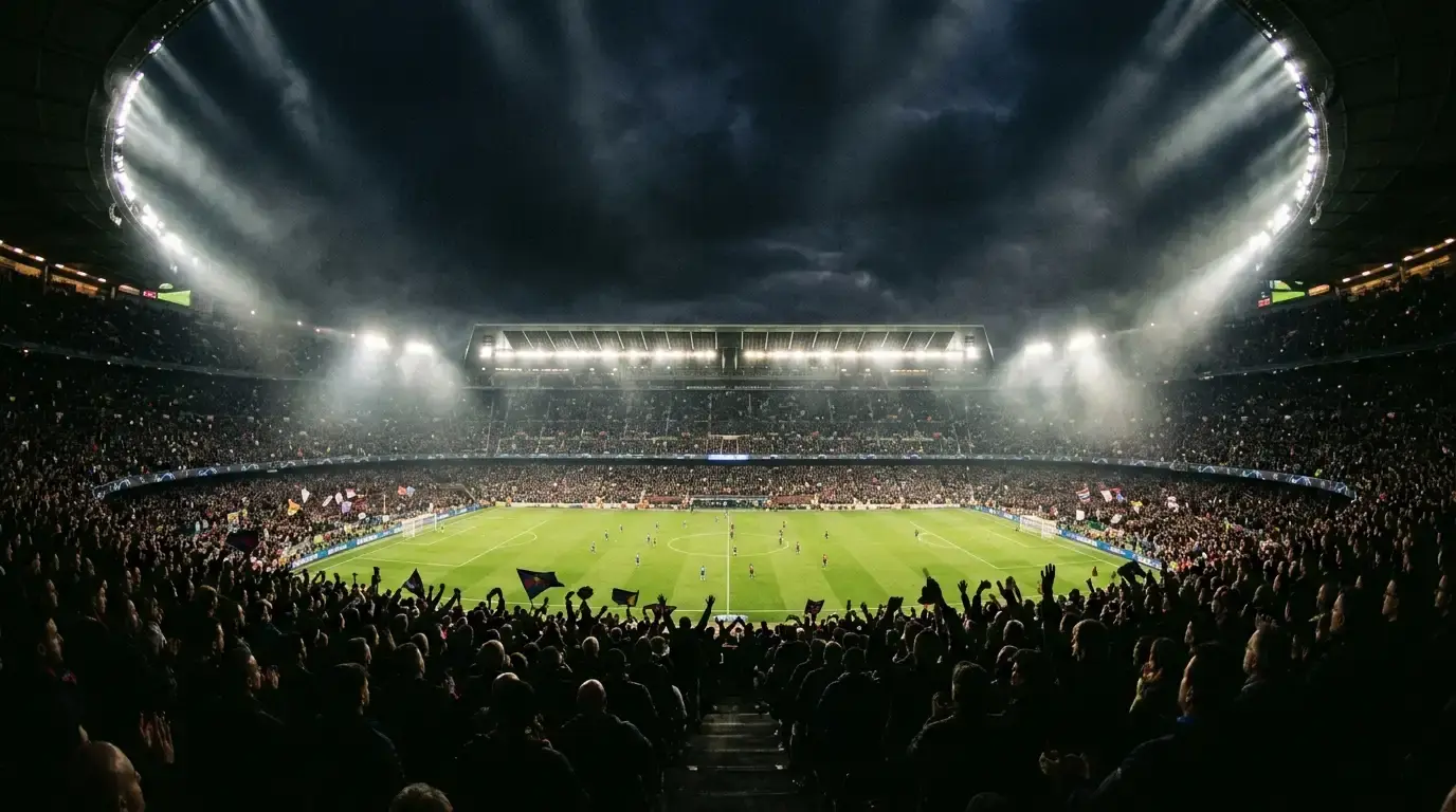 European football stadium glowing under floodlights on a Champions League night