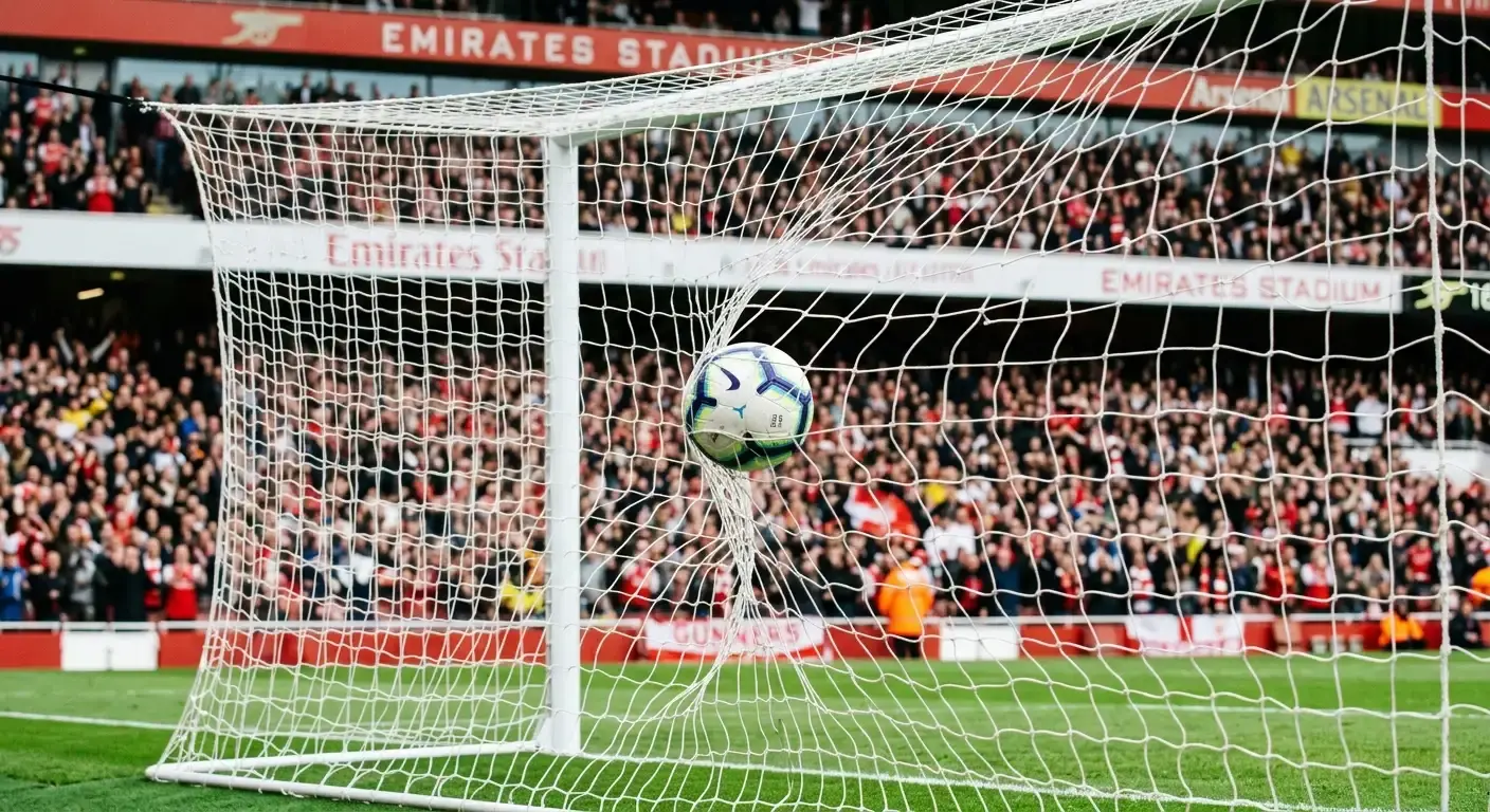 Football hitting the back of the net during a match, illustrating a team scoring