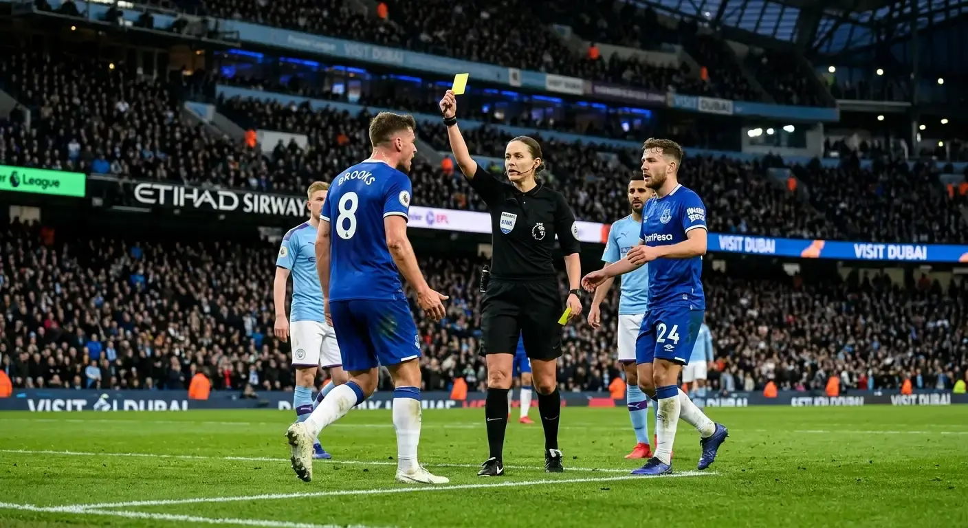 Strict referee brandishing a yellow card during a heated football match
